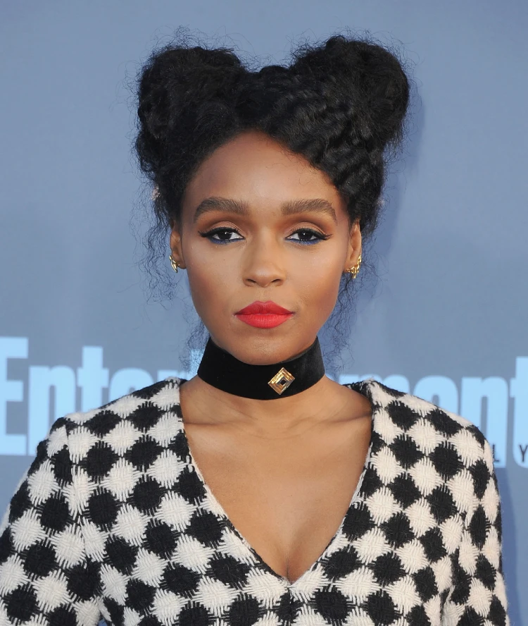 Janelle Monáe wearing soft puffy blunt curls