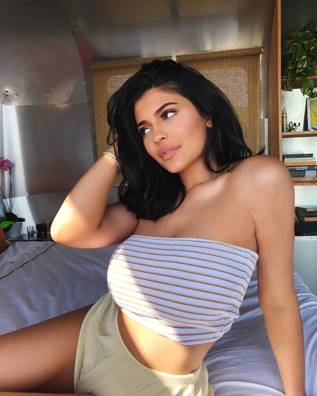 kylie Jenner shorts and strip top outfit