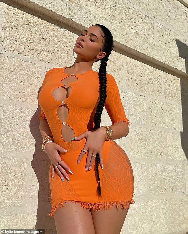 Celebrity Kylie Jenner Orange tight dress