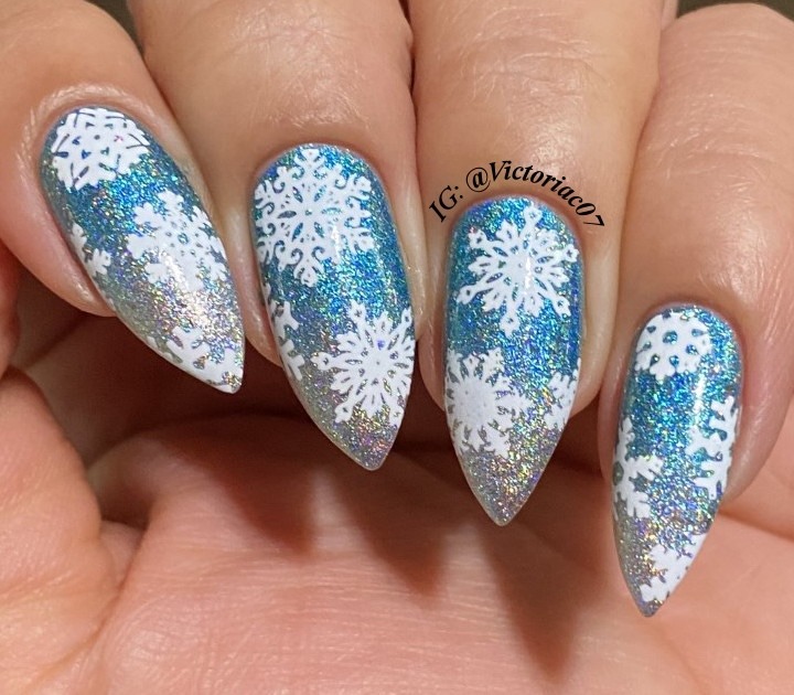Cute Blue Snowflakes Nails with Amazing Snowflake Design idea